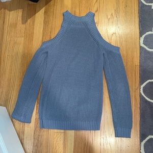 Light blue/gray sweater with shoulder cut outs. Worn once! In perfect condition